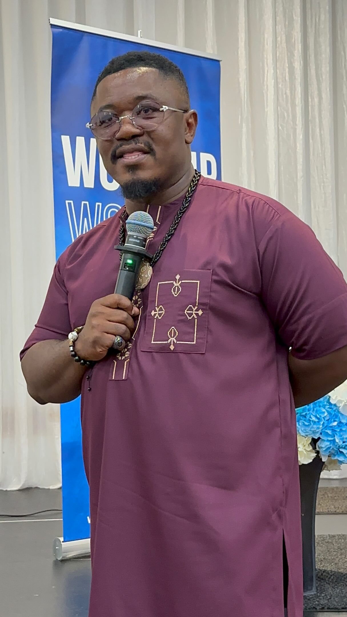 Hope Church minister speaking at an event